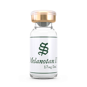A small clear vial with a gold cap labeled Melanotan-II (MT-2), 17 mg/3 mL, featuring a green symbol above the text, displayed against a black background.