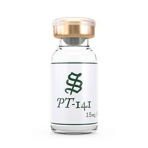 A small glass vial with a gold cap, labeled PT-141 (Bremelanotide) and 15mg in dark green text, containing white powder, set against a plain black background.